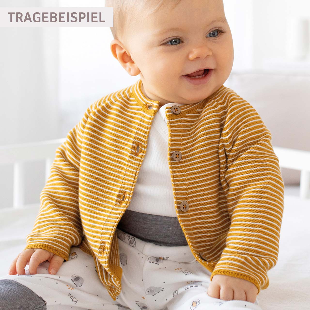 Kuschelige Baby Strickjacke Ringel