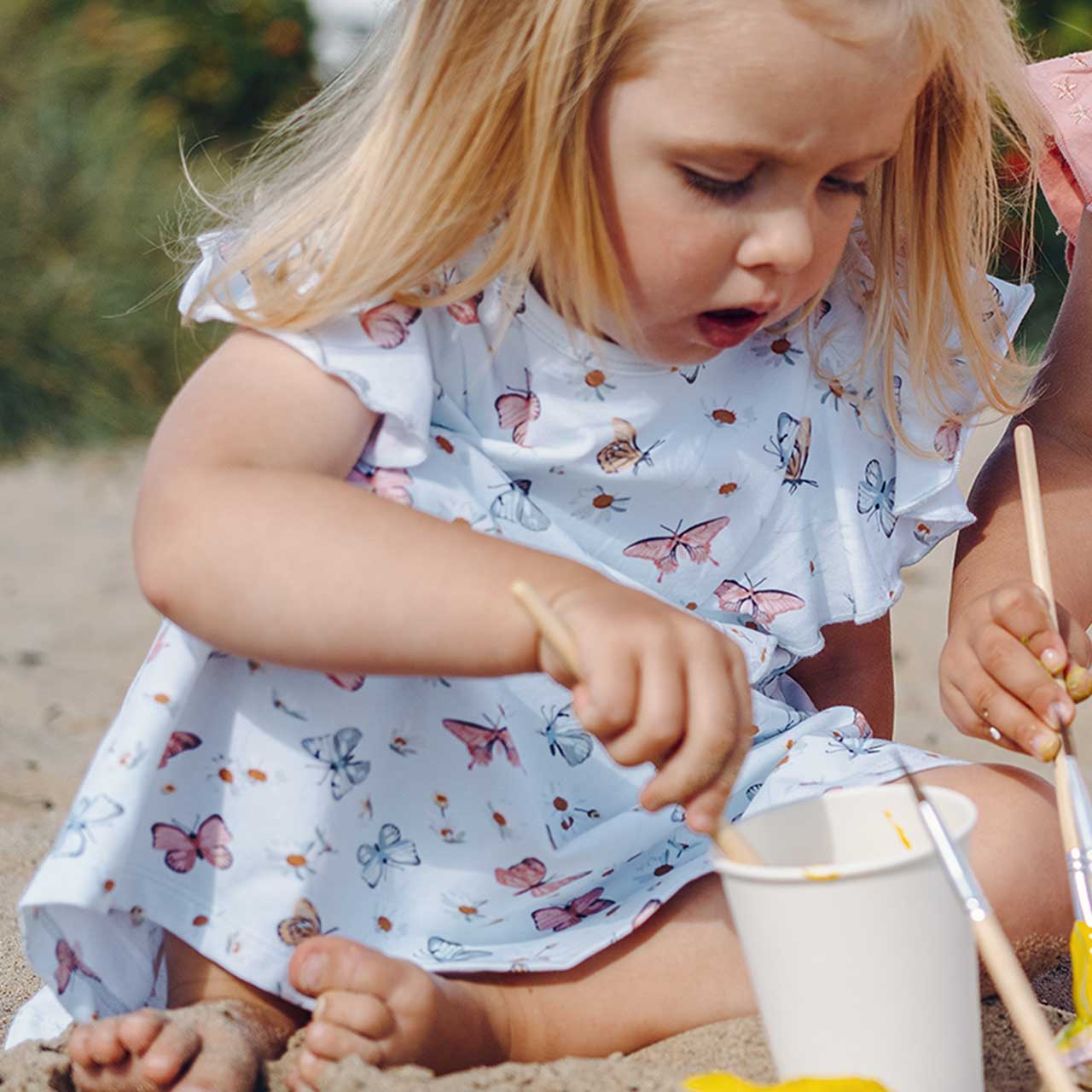 Sommer Kleid Rüschen Schmetterlinge hellblau